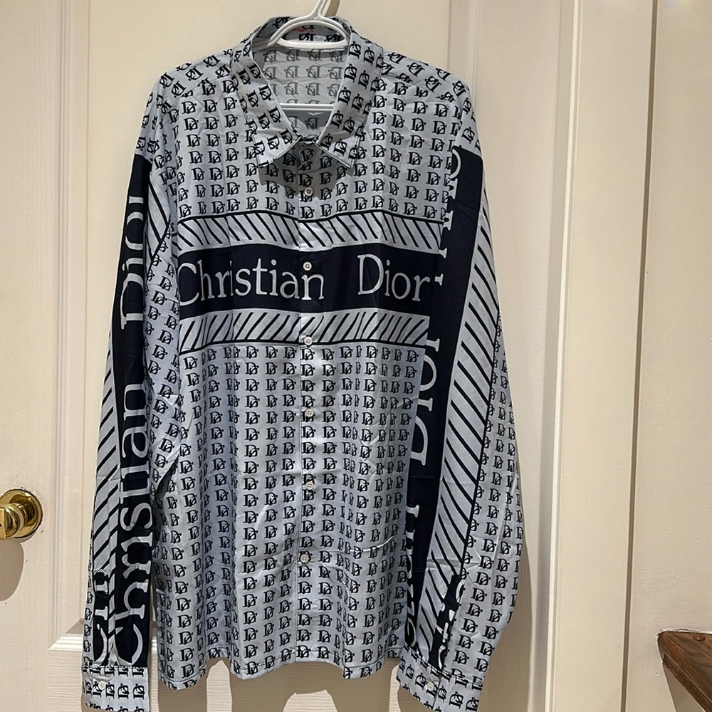 Large blouse (knock Off) . Listing as is